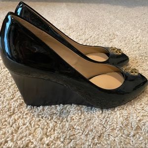 Size 6.5 Tory Burch wedges.  Never worn.